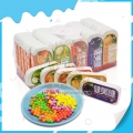 Bonbons colorés, sucrés et forts, à la pomme, à l'orange et à la fraise 