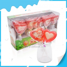 sucette avec des bonbons pétillants