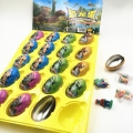 Nouveau produit amusant : un jouet en forme d'œuf de dinosaure coloré et bonbon 