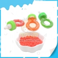 Mini bonbons durs colorés halal dans une bouteille en forme d'anneau 