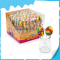bonbon sucette arc-en-ciel de forme ronde et colorée 