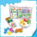 Jouet en plastique 3 en 1 avec des bonbons durs sucrés 