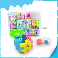 Jouets éducatifs de puzzle de dessin animé emballés dans une boîte, blocs de construction, jouets avec bonbons gélifiés 