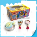 Mélange de bonbons en coton doux aux saveurs de fruits, de cercles et de guimauves tourbillonnantes 