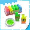 bocal à sifflet de dinosaure bon marché contenant des bonbons soda fruités sucrés 